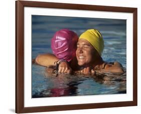 Female Swimmers Reacts to Victory-null-Framed Photographic Print