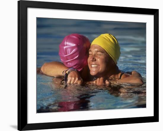 Female Swimmers Reacts to Victory-null-Framed Photographic Print