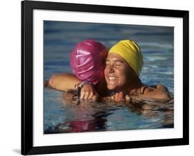 Female Swimmers Reacts to Victory-null-Framed Photographic Print