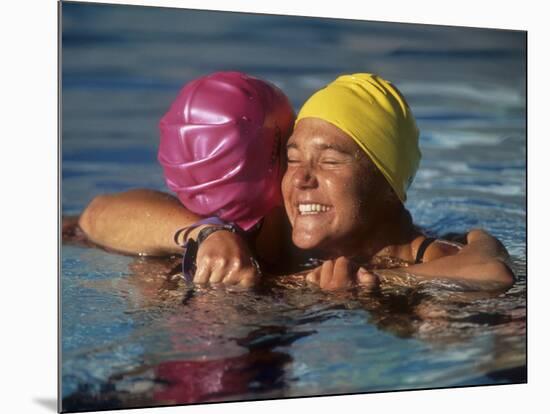 Female Swimmers Reacts to Victory-null-Mounted Photographic Print