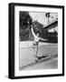 Female Tennis Player Reaching for Shot-null-Framed Photo