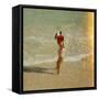 Female Tourist Enjoying Surf on a Florida Beach-Yale Joel-Framed Stretched Canvas