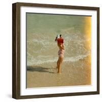 Female Tourist Enjoying Surf on a Florida Beach-Yale Joel-Framed Photographic Print