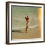 Female Tourist Enjoying Surf on a Florida Beach-Yale Joel-Framed Photographic Print