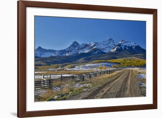 Fence Lined road and San Juan Mountain Range, Colorado-Darrell Gulin-Framed Premium Photographic Print