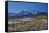 Fence Lined road and San Juan Mountain Range, Colorado-Darrell Gulin-Framed Stretched Canvas