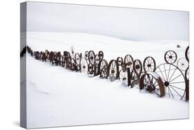 Fence Made of Old Iron Wheels on Snow-Terry Eggers-Stretched Canvas