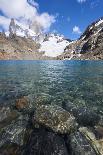 Stones seen through the water of Lago de los Tres featuring Monte Fitz Roy in the background, Patag-Fernando Carniel Machado-Photographic Print