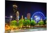 Ferris Wheel and Buildings Seen from Olympic Centennial Park at Night in Atlanta, Georgia.-Jon Bilous-Mounted Photographic Print