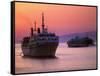 Ferry & Marine Traffic at Mykonos Harbor, Greece-Walter Bibikow-Framed Stretched Canvas