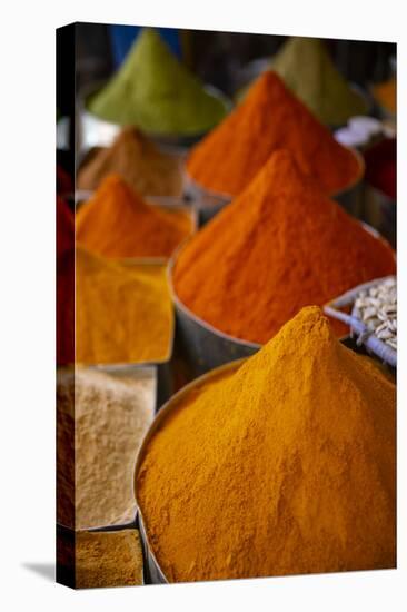 Fez, Morocco. Colorful ground spices tower shaped, farmers market-Jolly Sienda-Stretched Canvas