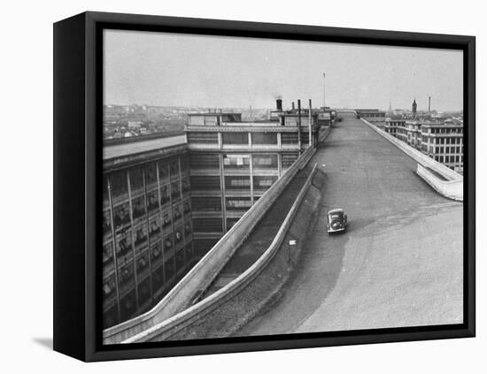 Fiat Car Driving Along the Desolate Street-Carl Mydans-Framed Stretched Canvas