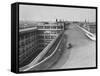 Fiat Car Driving Along the Desolate Street-Carl Mydans-Framed Stretched Canvas
