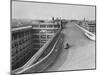 Fiat Car Driving Along the Desolate Street-Carl Mydans-Mounted Photographic Print