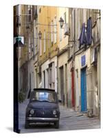 Fiat Driving in Narrow Street, Sassari, Sardinia, Italy-Doug Pearson-Stretched Canvas