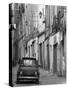 Fiat Driving in Narrow Street, Sassari, Sardinia, Italy-Doug Pearson-Stretched Canvas