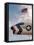 Fighter Jet and Flag along US Highway 50, Fallon, Nevada, USA-Scott T. Smith-Framed Stretched Canvas