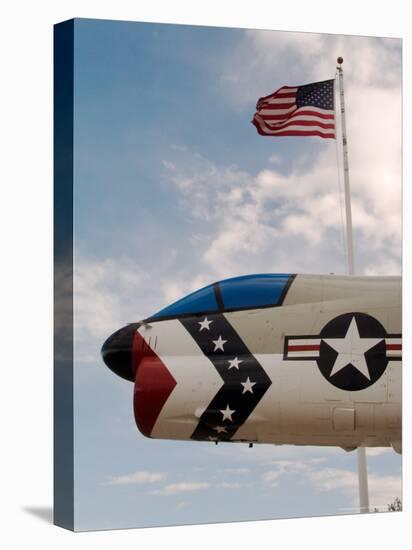 Fighter Jet and Flag along US Highway 50, Fallon, Nevada, USA-Scott T. Smith-Stretched Canvas