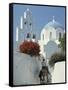 Figure on Donkey Passing Church Bell Tower and Dome, Vothonas, Santorini, Cyclades Islands, Greece-Short Michael-Framed Stretched Canvas