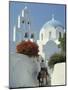 Figure on Donkey Passing Church Bell Tower and Dome, Vothonas, Santorini, Cyclades Islands, Greece-Short Michael-Mounted Photographic Print