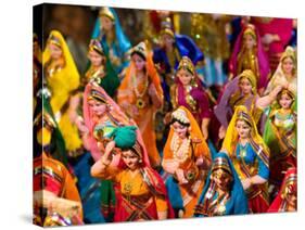 Figurines at the Saturday Market, Goa, India-Walter Bibikow-Stretched Canvas