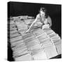 File Clerk at the Fbi Working with a Table Covered with Files-null-Stretched Canvas