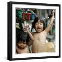 Filipino Children React as They Get a Shower Outside Their Homes-null-Framed Premium Photographic Print