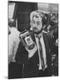 Film Director Stanley Kubrick Holding Polaroid Camera During Filming of "2001: A Space Odyssey"-Dmitri Kessel-Mounted Premium Photographic Print