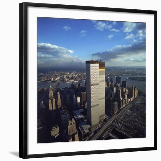 Financial District with World Trade Center's Twin Towers Dwarfing Rest of Wall Street Buildings-Henry Groskinsky-Framed Photographic Print