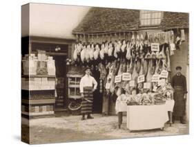 Fine Display of Meat Displayed Outside a Butcher's Shop-null-Stretched Canvas
