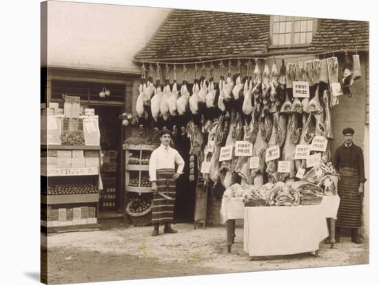 Fine Display of Meat Displayed Outside a Butcher's Shop-null-Stretched Canvas