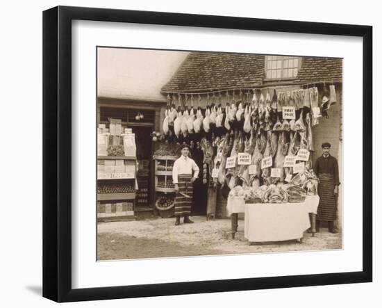 Fine Display of Meat Displayed Outside a Butcher's Shop-null-Framed Premium Photographic Print