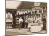 Fine Display of Meat Displayed Outside a Butcher's Shop-null-Mounted Premium Photographic Print