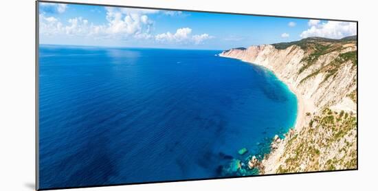 Fine sand of Ammos beach and cliffs washed by the crystal turquoise sea, overhead view, Kefalonia-Roberto Moiola-Mounted Photographic Print