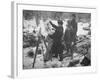 Finnish Soldiers Looking at a Patriotic Poster Left Behind by Defeated Russian Troops-Carl Mydans-Framed Premium Photographic Print