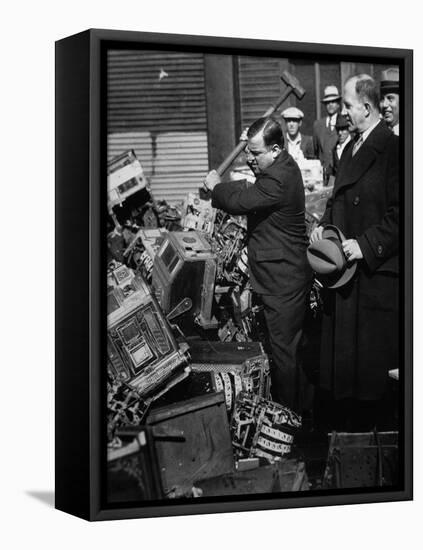 Fiorello La Guardia (1882-1947) Smashing Confiscated Slot Machines, 1934 (B/W Photo)-American Photographer-Framed Stretched Canvas