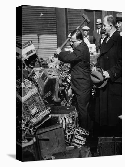 Fiorello La Guardia (1882-1947) Smashing Confiscated Slot Machines, 1934 (B/W Photo)-American Photographer-Stretched Canvas