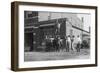 Firefighter Jumps Into Net Held By Fellow Firemen-null-Framed Art Print