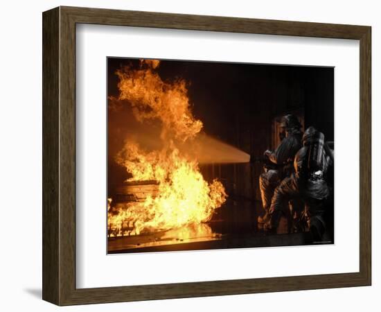 Firefighters Extinguishing a Simulated Battery Fire-Stocktrek Images-Framed Photographic Print