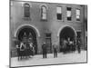 Firefighters Posing in Front of their Firehouse-Allan Grant-Mounted Photographic Print