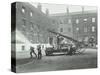 Fireman Using a Hose, London Fire Brigade Headquarters, London, 1910-null-Stretched Canvas