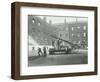 Fireman Using a Hose, London Fire Brigade Headquarters, London, 1910-null-Framed Photographic Print