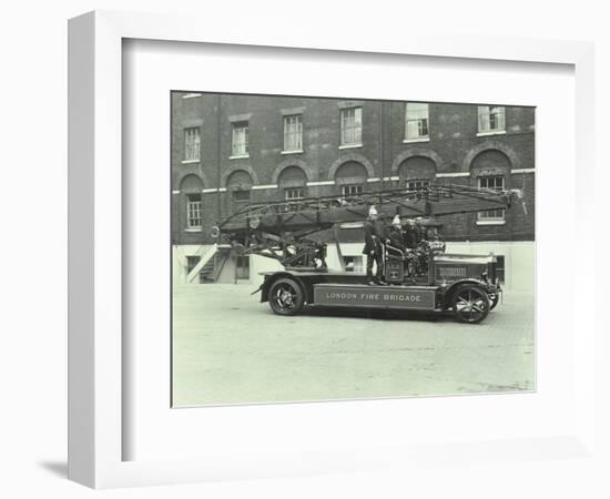 Firemen Aboard a Fire Engine, London Fire Brigade Headquarters, London, 1929-null-Framed Photographic Print