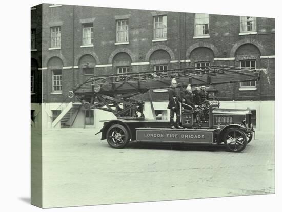 Firemen Aboard a Fire Engine, London Fire Brigade Headquarters, London, 1929-null-Stretched Canvas