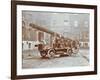 Firemen Aboard a Motor Fire Escape Vehicle, London Fire Brigade Headquarters, London, 1909-null-Framed Photographic Print