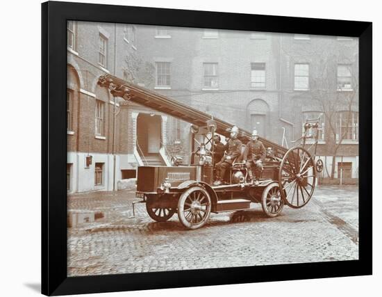 Firemen Aboard a Motor Fire Escape Vehicle, London Fire Brigade Headquarters, London, 1909-null-Framed Photographic Print