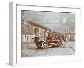 Firemen Aboard a Motor Fire Escape Vehicle, London Fire Brigade Headquarters, London, 1909-null-Framed Photographic Print