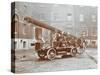 Firemen Aboard a Motor Fire Escape Vehicle, London Fire Brigade Headquarters, London, 1909-null-Stretched Canvas