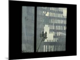 Firemen are Seen Spraying Water on the Smoldering Ruins of the World Trade Center-null-Mounted Photographic Print