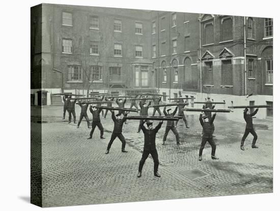 Firemen Carrying Out Scaling Ladder Drill, London Fire Brigade Headquarters, 1910-null-Stretched Canvas